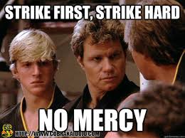 Cobra Kai: Strike First Strike Hard No Mercy Logo